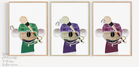 Three Art prints featuring koalas playing hurling wearing different shirt colors 