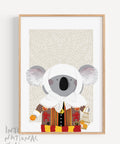 Souvenir art print frames featuring a koala wearing Gilles Costume.