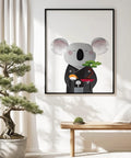 Room decorated in Japanese style with a black-framed picture featuring a print of a koala wearing traditional Japanese clothing, holding sushi in one paw and a bonsai in the other."



Room decorated in Japanese style with a black-framed picture featuring a print of a koala wearing traditional Japanese clothing, holding sushi in one paw and a bonsai in the other."


 black-framed picture featuring a print of a koala wearing traditional Japanese clothing, holding sushi and a bonsai 






