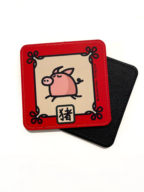Coaster with a cartoon pig from the Chinese Zodiac and Chinese character meaning "pig" on a red border