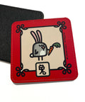 Coaster with illustration of the Rabbit Chinese Zodiac sign with a red border and its name in Chinese