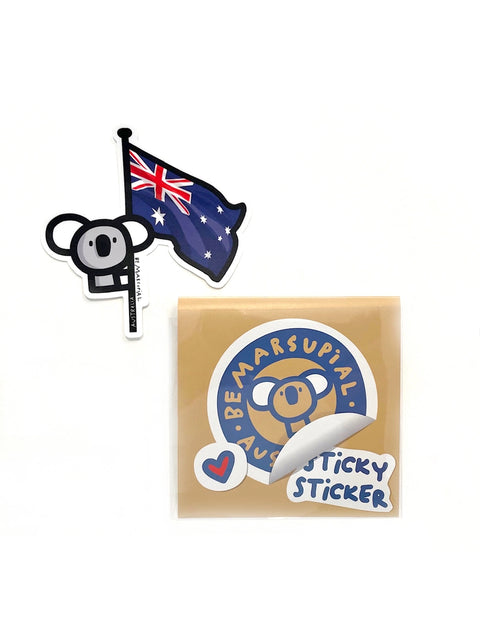 Die-cut vinyl sticker of a koala perched on an Australian flag pole