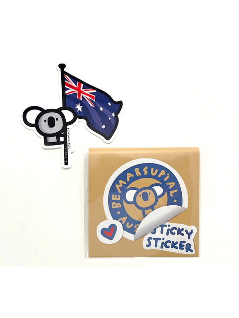 Die-cut vinyl sticker of a koala perched on an Australian flag pole