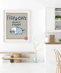 Art print framed on a living room wall featuring a poster about first Fish & Chips in Sydney, Australia